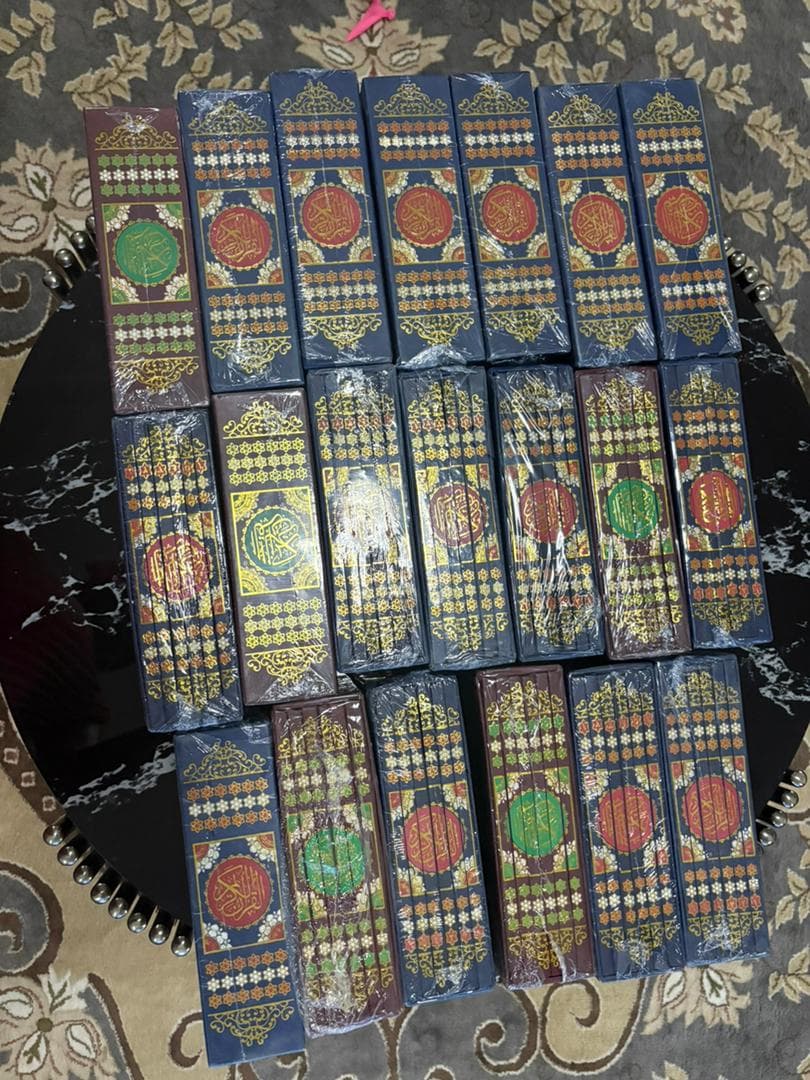 Twenty boxed sets of the Qur'an ready for distribution